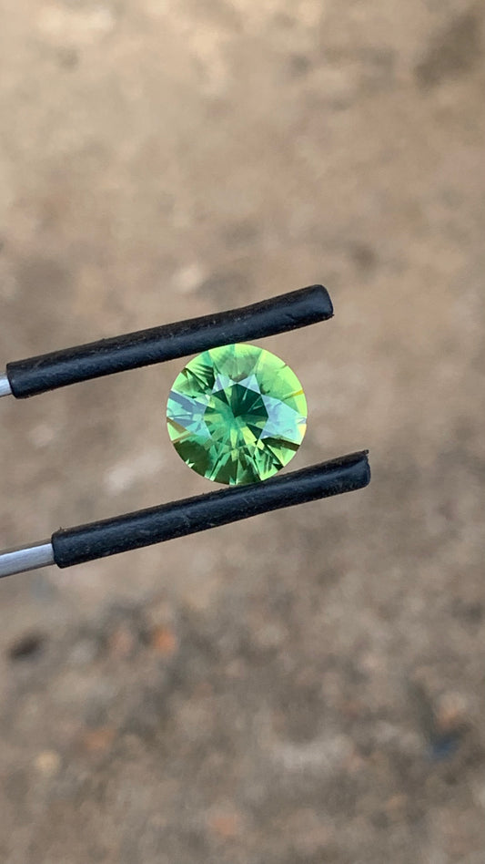Natural Central Queensland sapphire 9.56mm round green gemstone