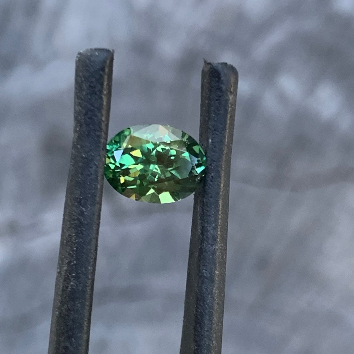 Natural Australian green sapphire, 1.24ct oval cut