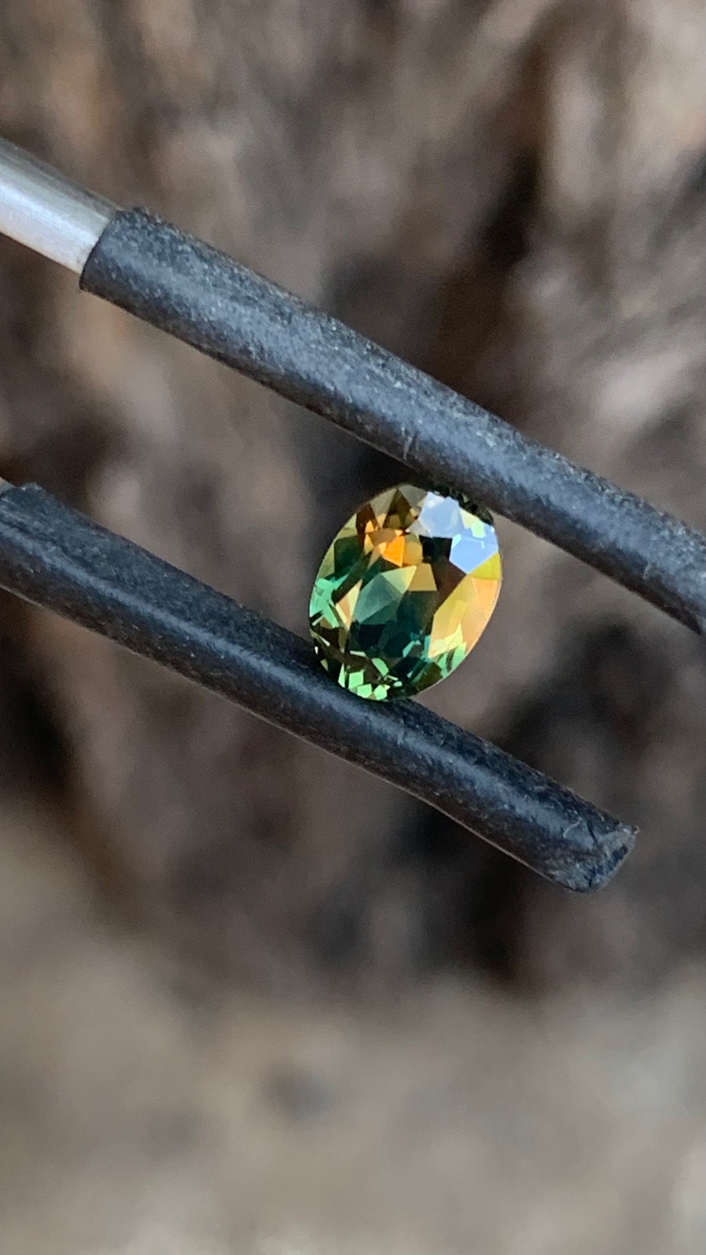 Natural Australian parti sapphire with unique green and orange colour zoning