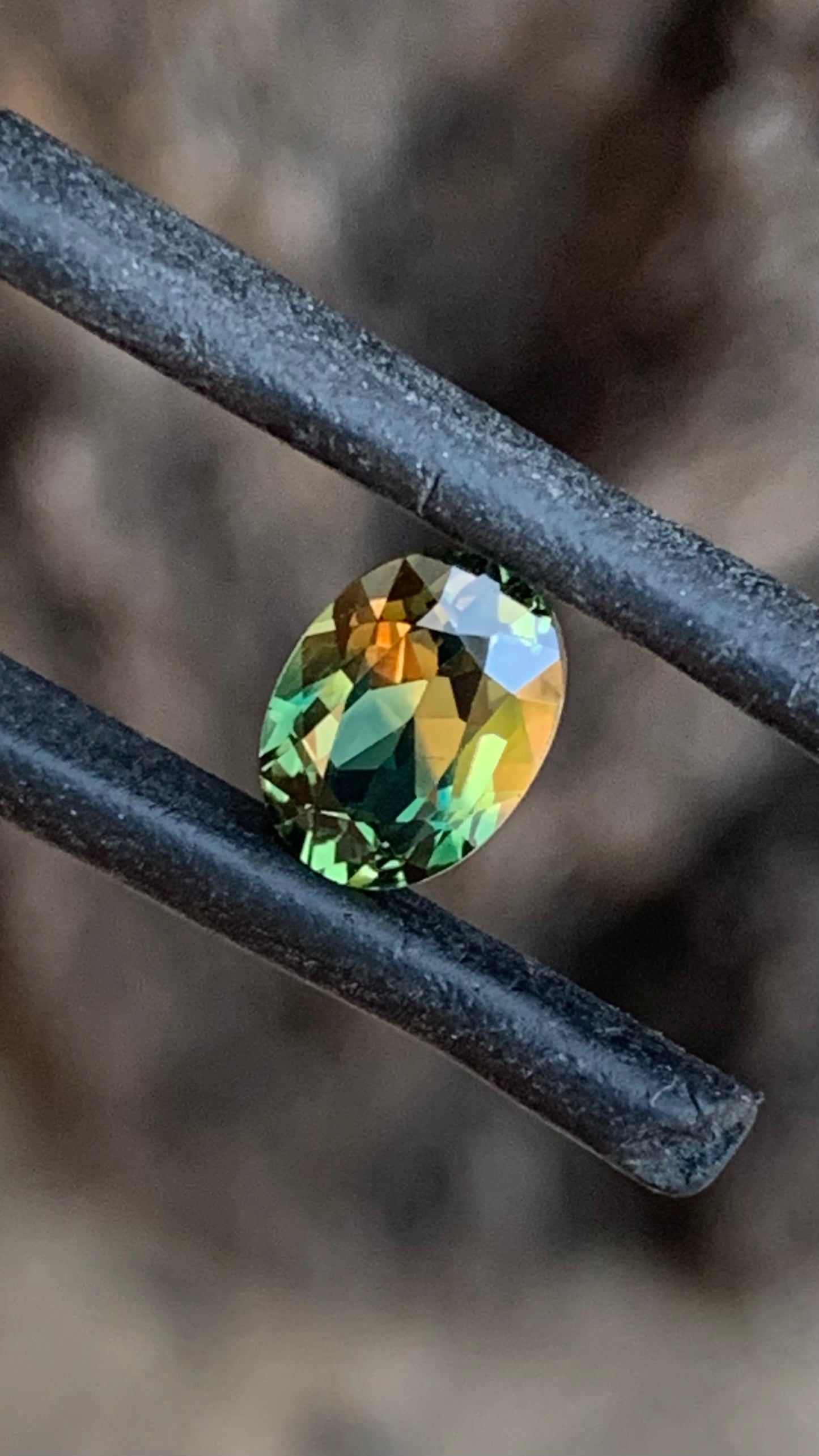 1.25ct green and orange parti Australian sapphire oval cut