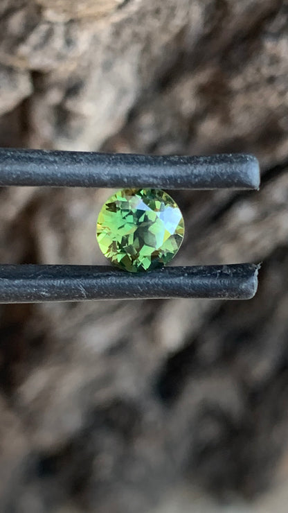 1.38ct bright green Australian sapphire round cut from the Central Queensland Gemfields