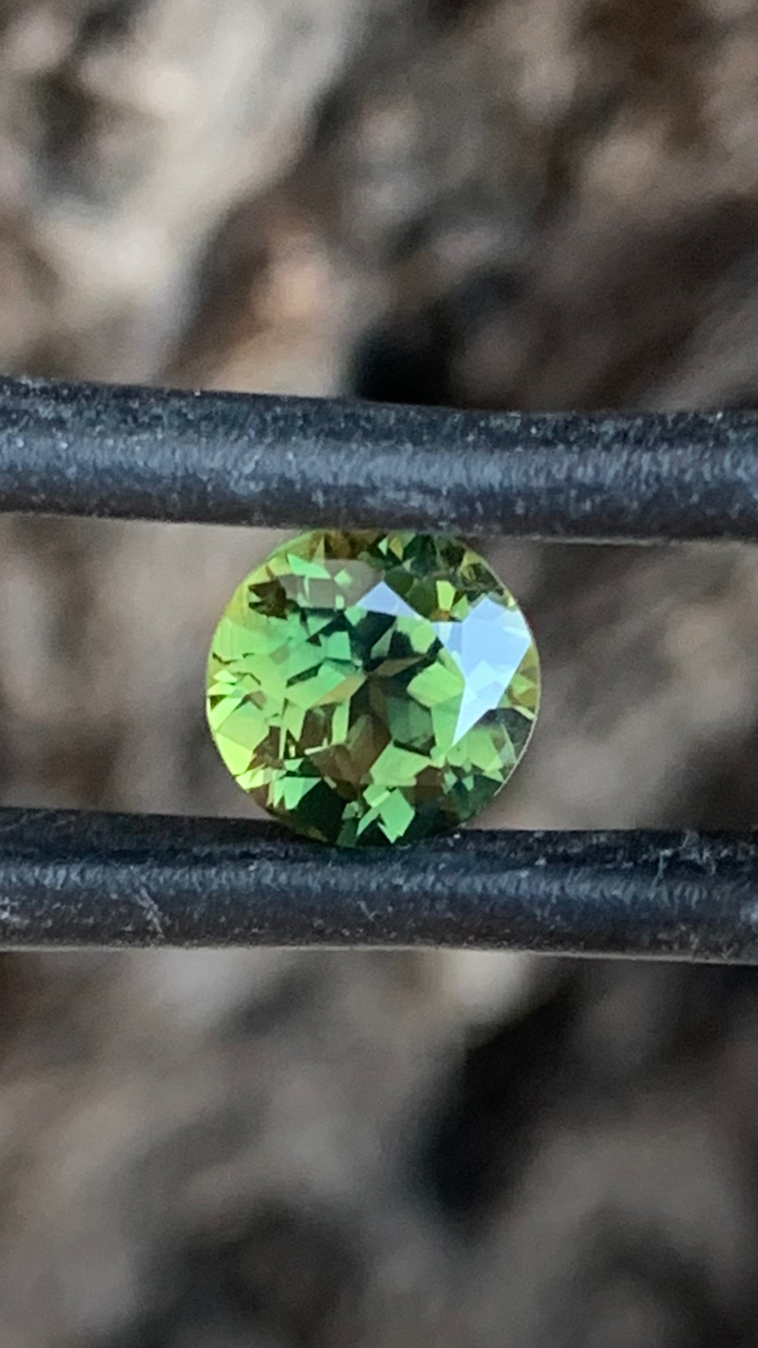 Round Australian sapphire with bright green colour and lively sparkle