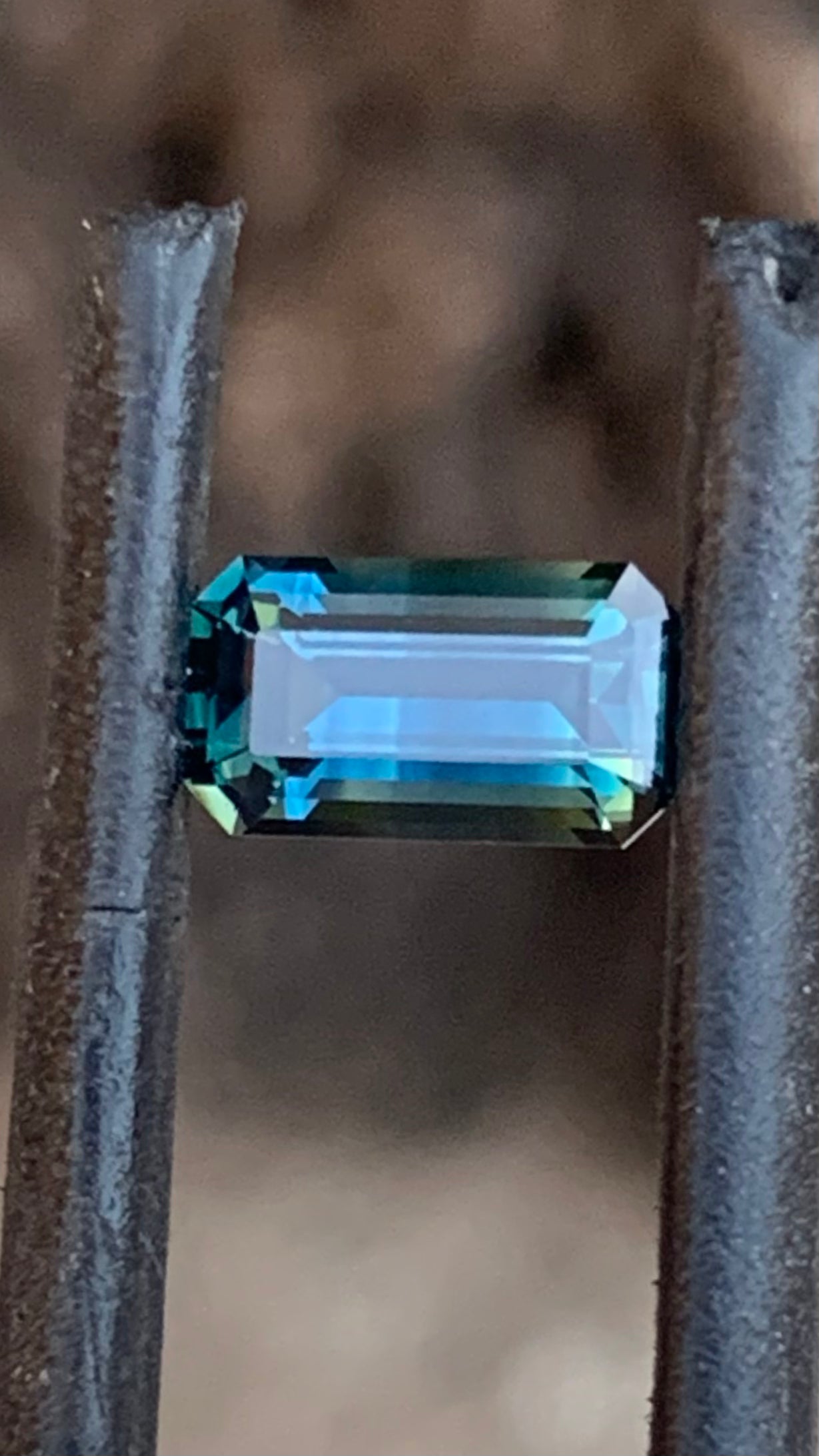 Emerald cut Australian sapphire with unique two-tone blue parti colour
