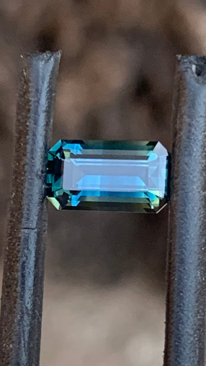 Emerald cut Australian sapphire with unique two-tone blue parti colour