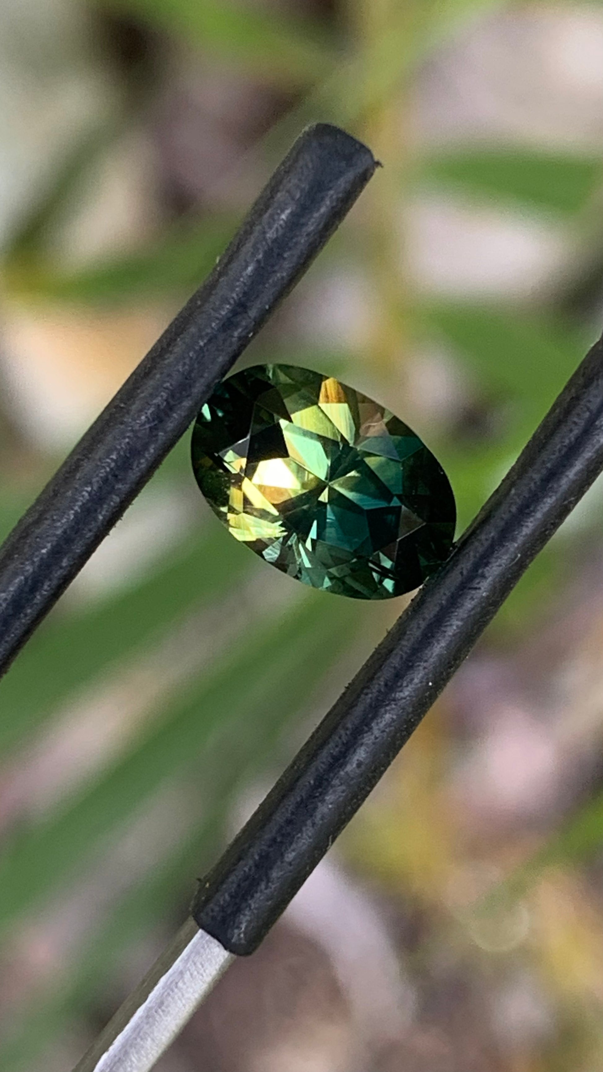 1. Natural Central Queensland sapphire 9.01mm oval tri-colour parti gemstone