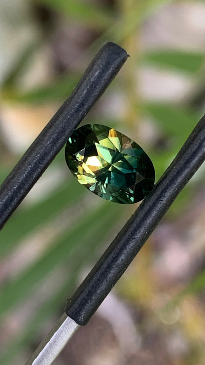 1. Natural Central Queensland sapphire 9.01mm oval tri-colour parti gemstone