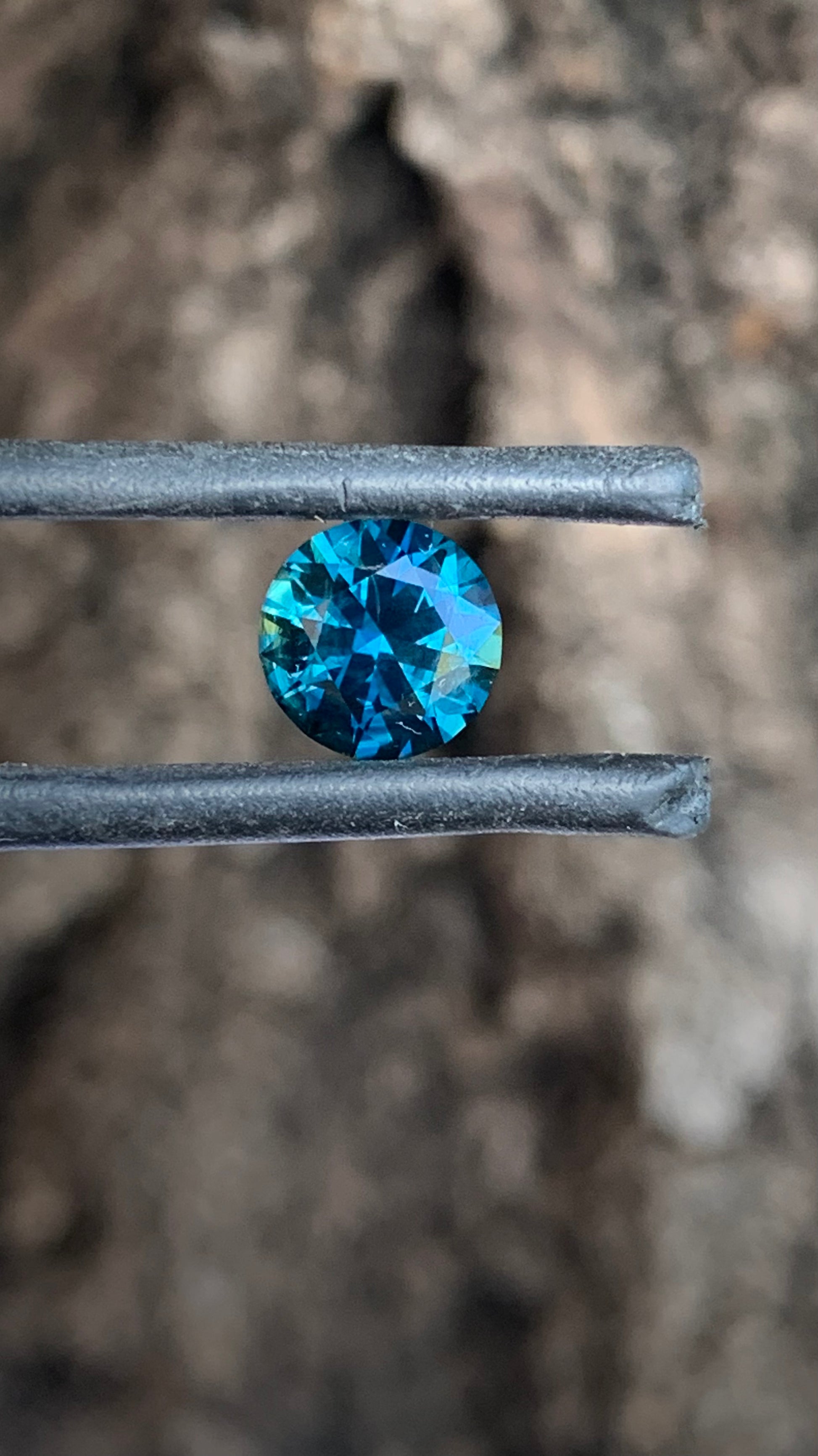Round Australian sapphire with moody saturated blue tones