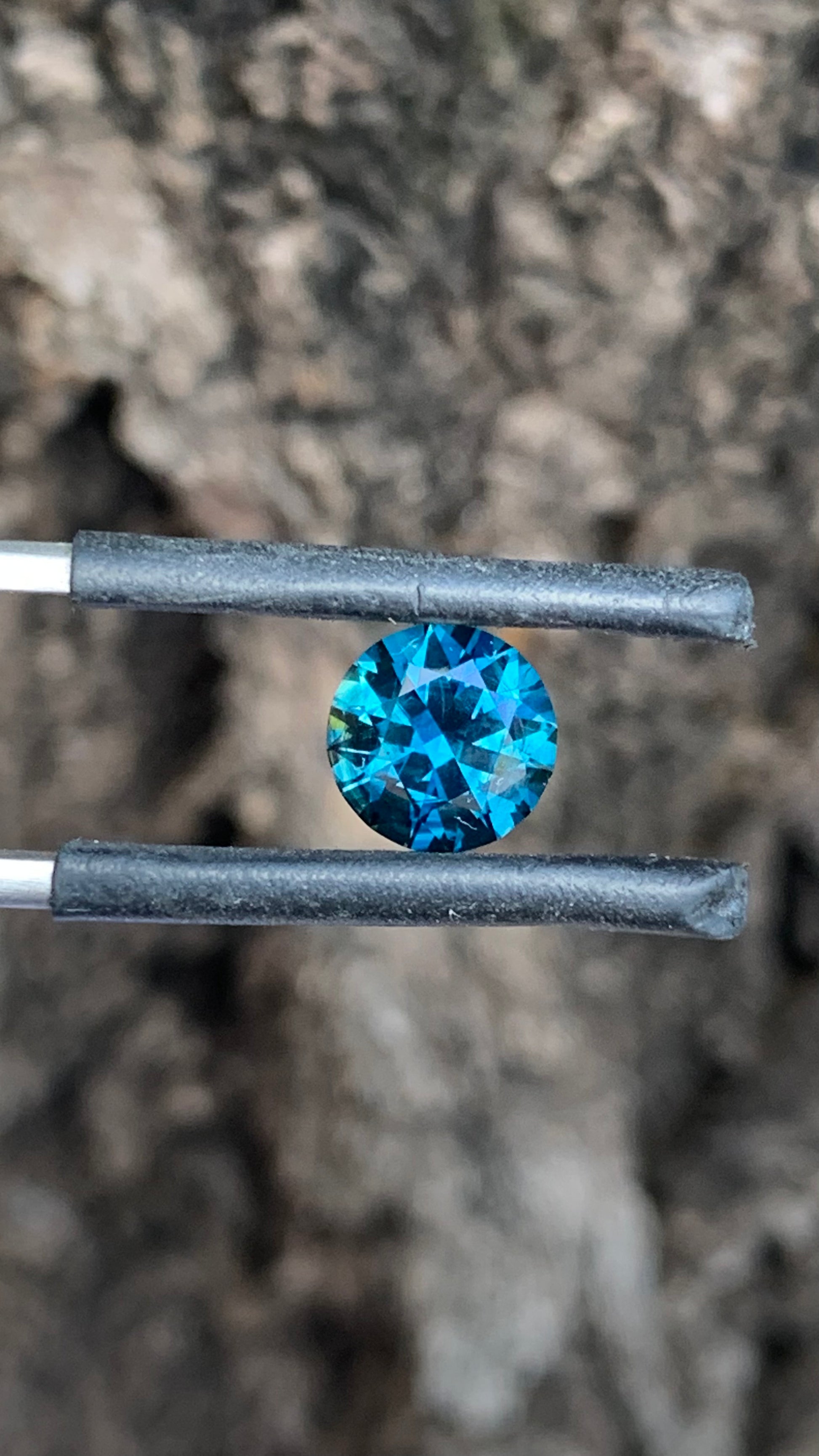 Natural Australian sapphire with deep rich blue colour and round cut