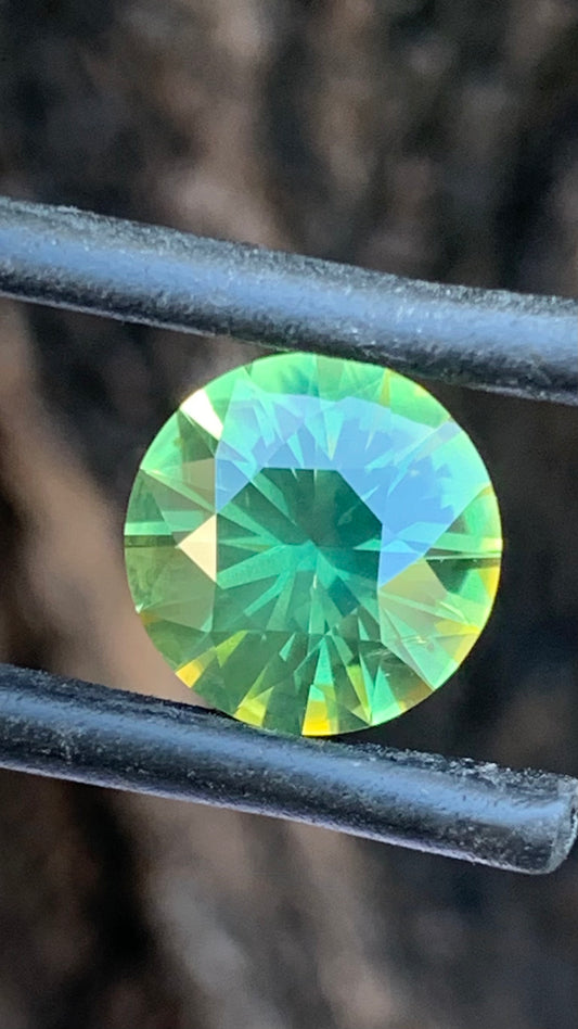 3.505ct vivid green Australian sapphire round cut from the Central Queensland Gemfields