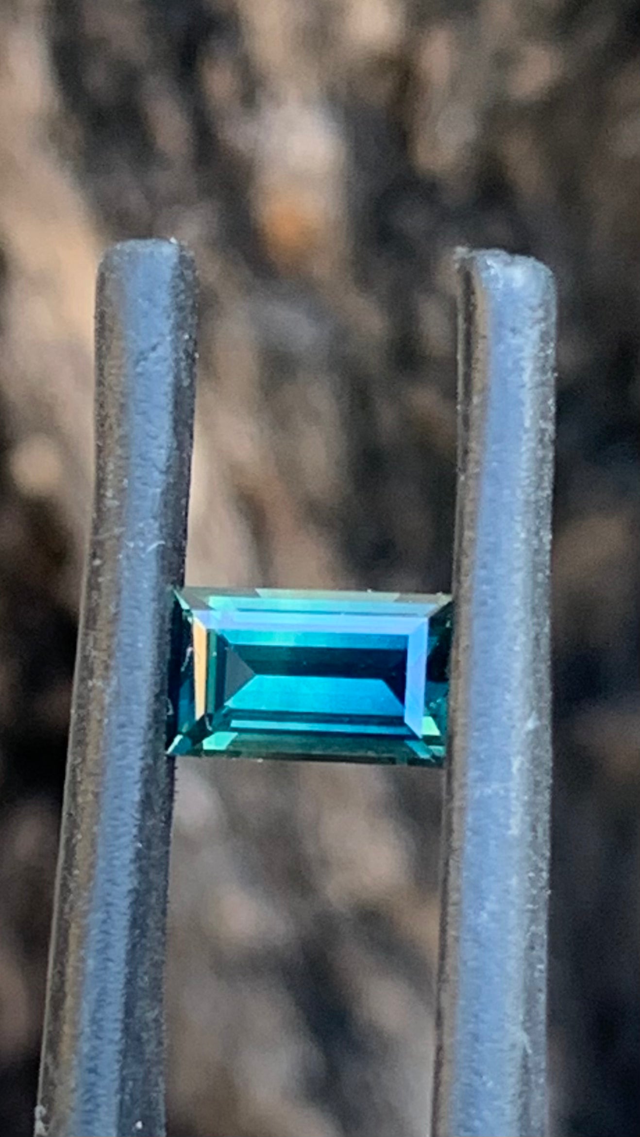 0.935ct green blue Australian sapphire baguette cut from the Central Queensland Gemfields