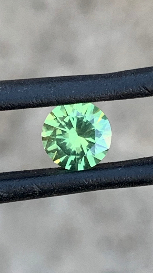 1.055ct green Australian sapphire round cut from the Central Queensland Gemfields