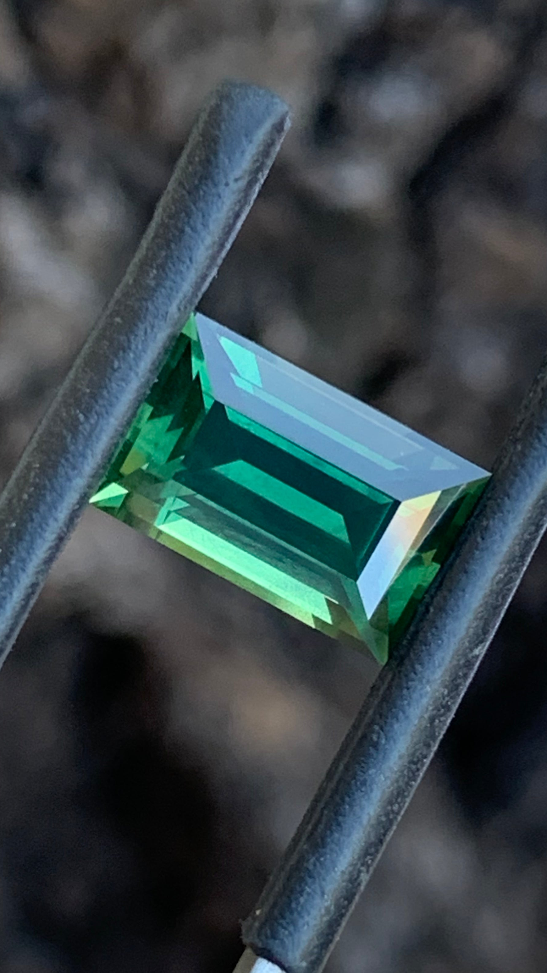 3.480ct green Australian sapphire baguette cut from the Central Queensland Gemfields
