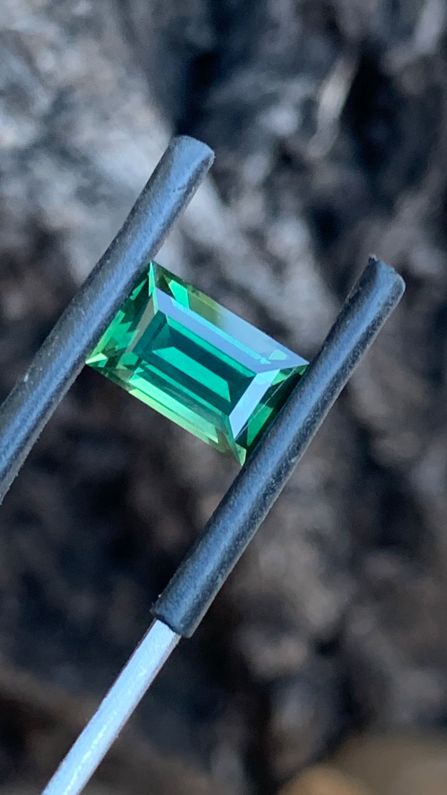 Natural Central Queensland sapphire 10.09mm baguette cut green gemstone