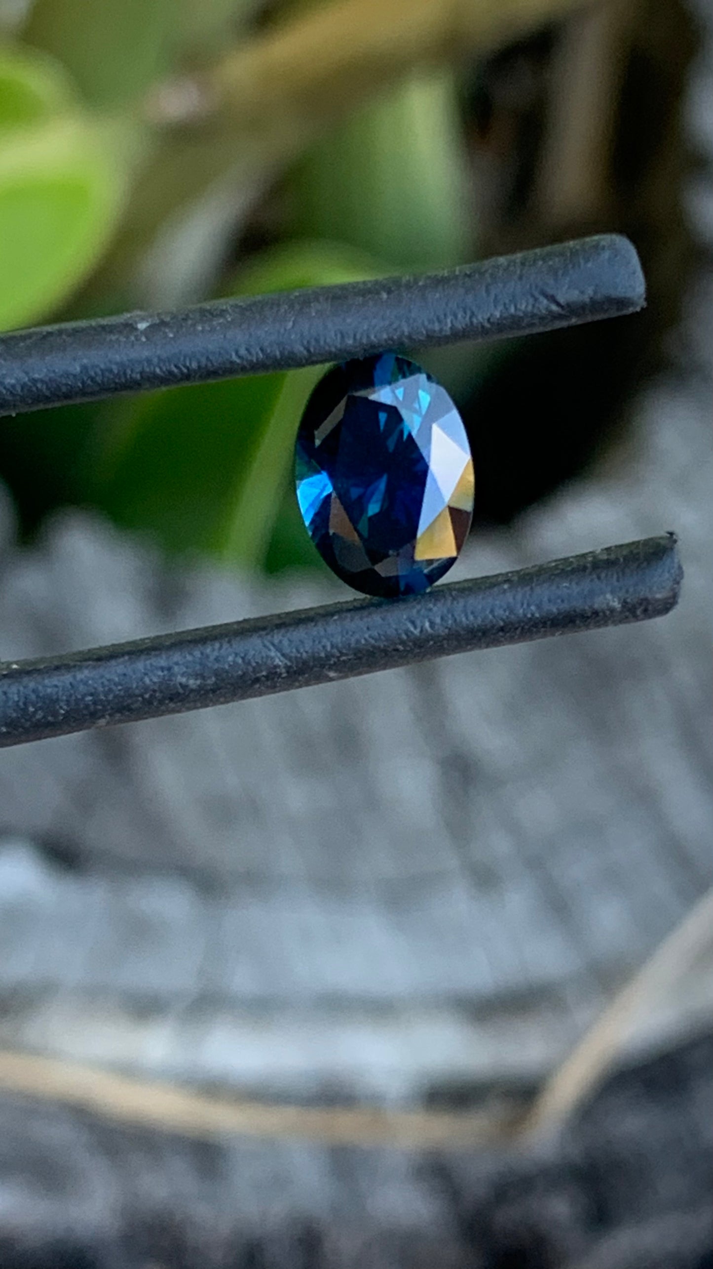 Natural Australian sapphire with rich deep blue colour and classic oval cut