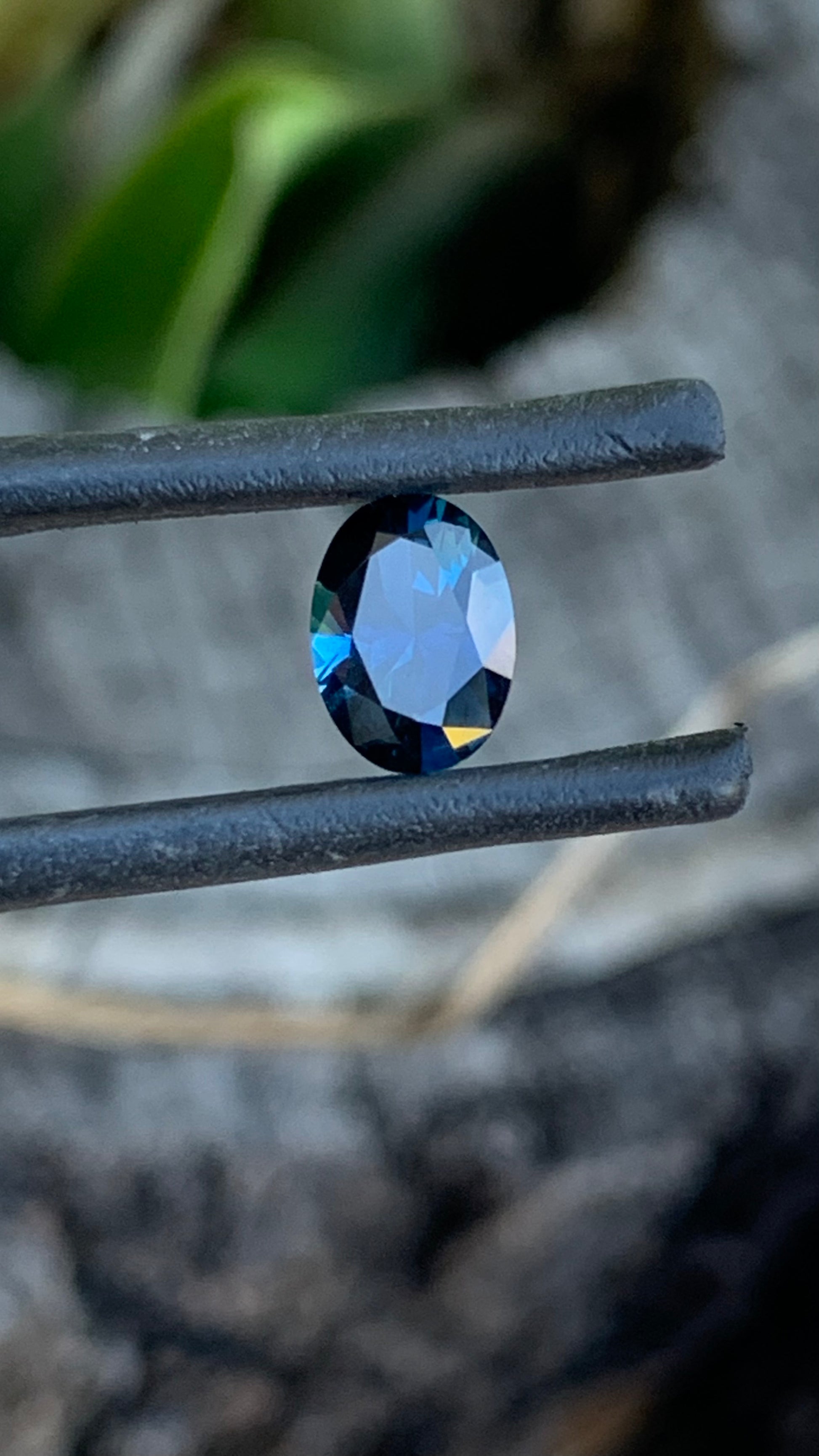 Natural Central Queensland sapphire 7.61mm oval cut deep blue gemstone