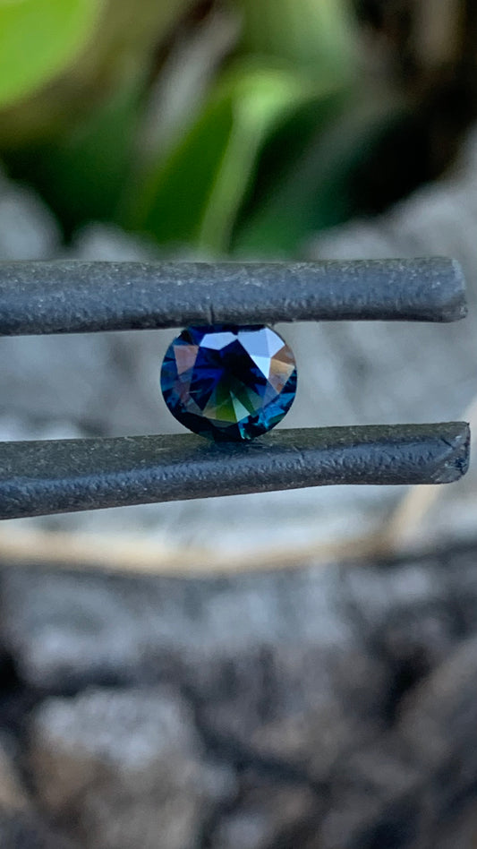 Natural Australian sapphire with rich dark blue colour and classic round cut