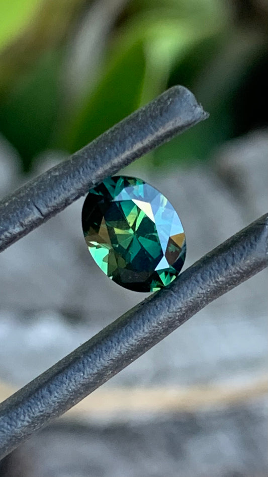 1.045ct green Australian sapphire oval cut from the Central Queensland Gemfields
