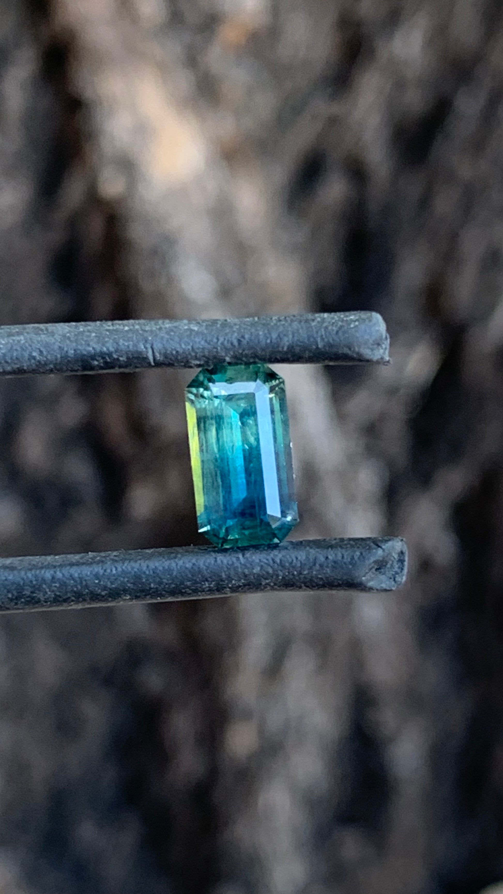 Emerald cut Australian sapphire with striking blue parti colour transition