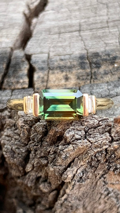 Emerald Cut Sapphire Ring with baguette diamond accents