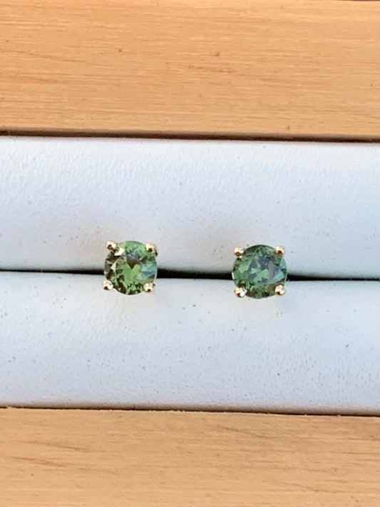 Green Australian Sapphires set in yellow gold stud earrings