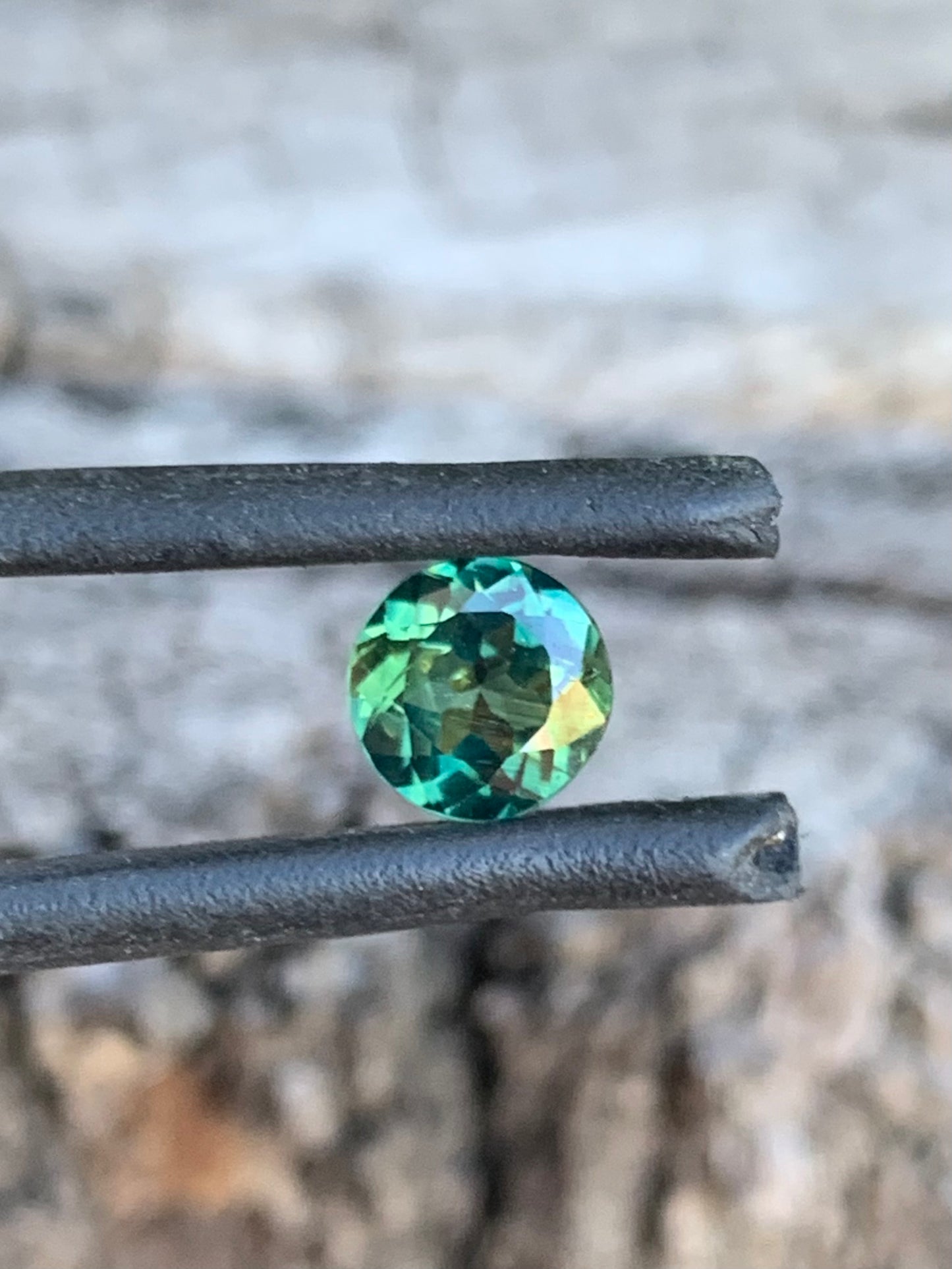 1.03ct round teal parti Australian sapphire