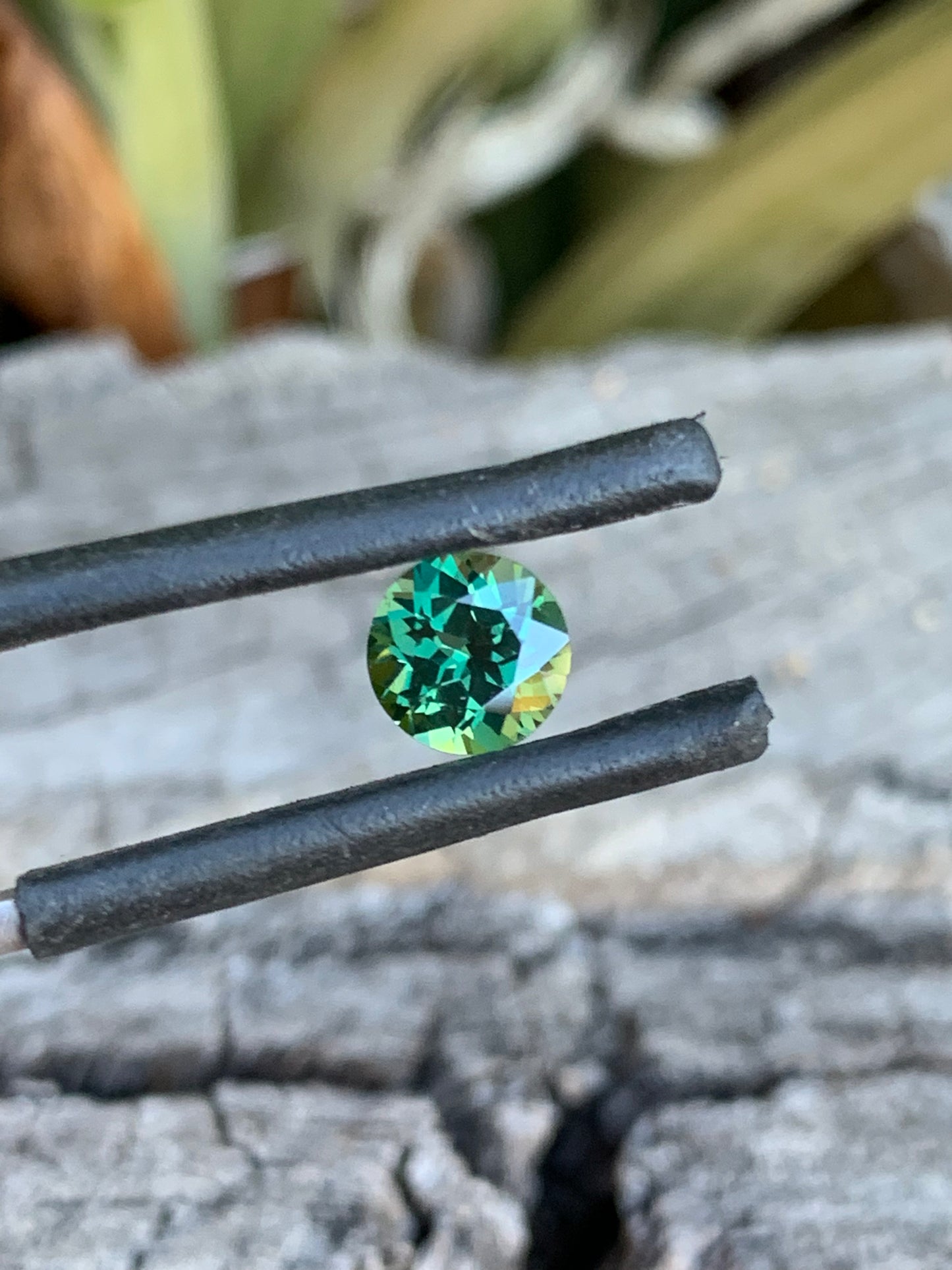 Close-up of 1.09ct green sapphire showing natural colour and brilliance