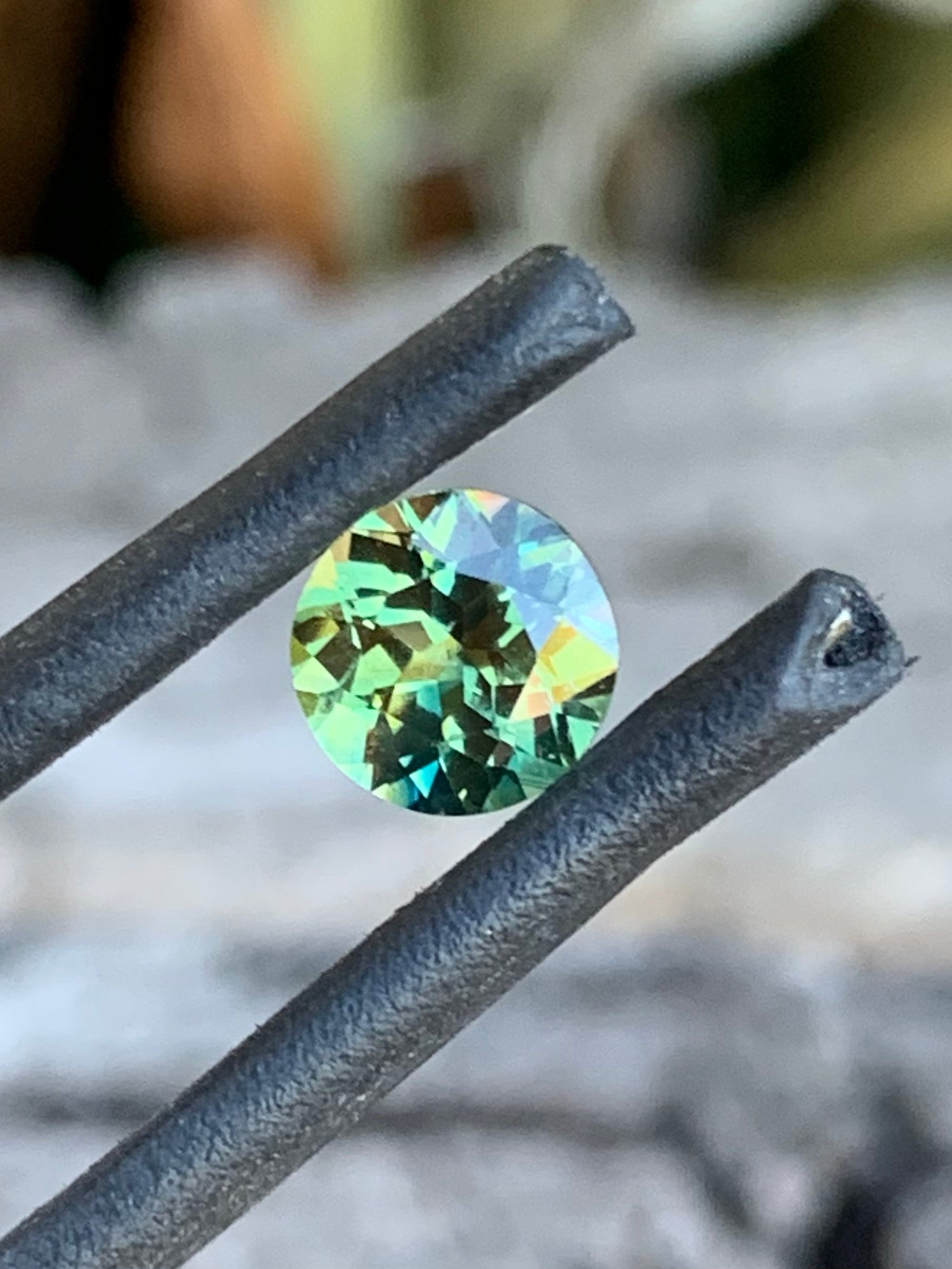 1.06ct wattle parti Australian sapphire with yellow and green tones