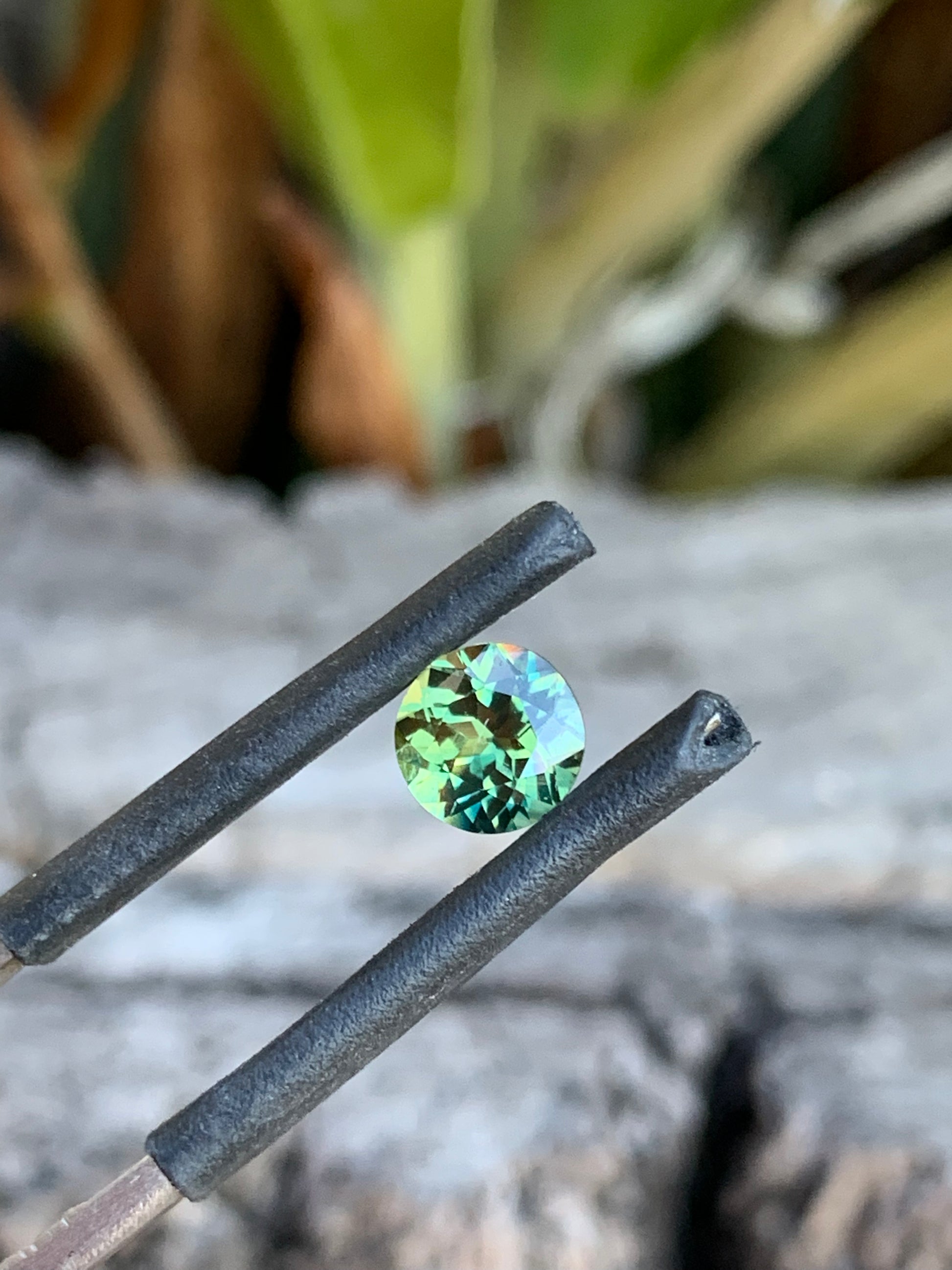 Parti sapphire featuring natural yellow and green zoning