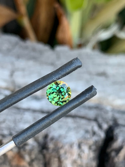 Round cut Australian sapphire with bright green tones