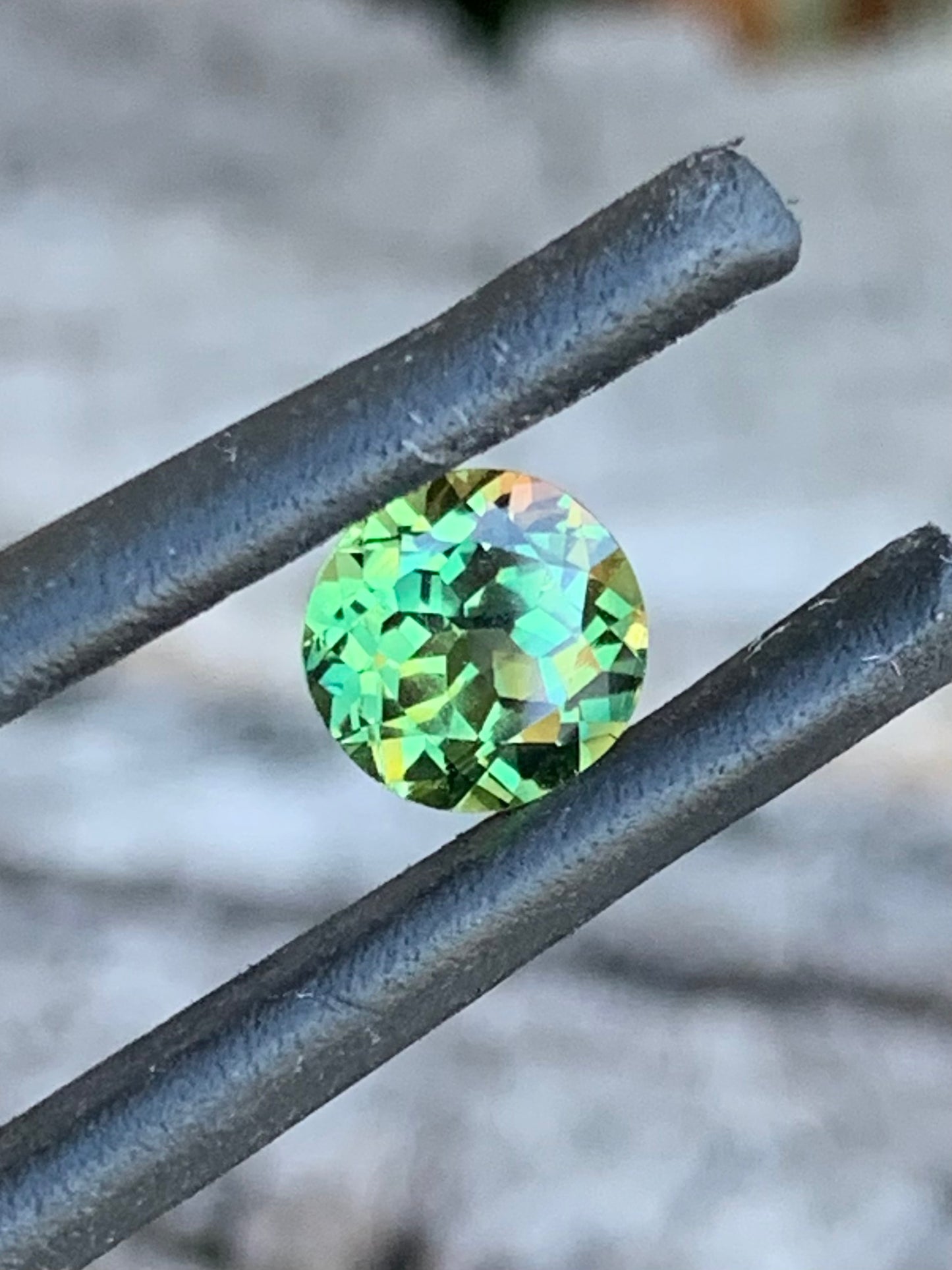1.01ct light green Australian sapphire in a round cut