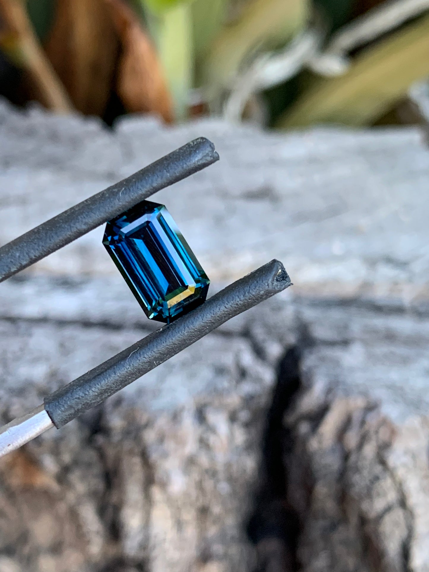 Emerald cut Australian sapphire with deep blue tones