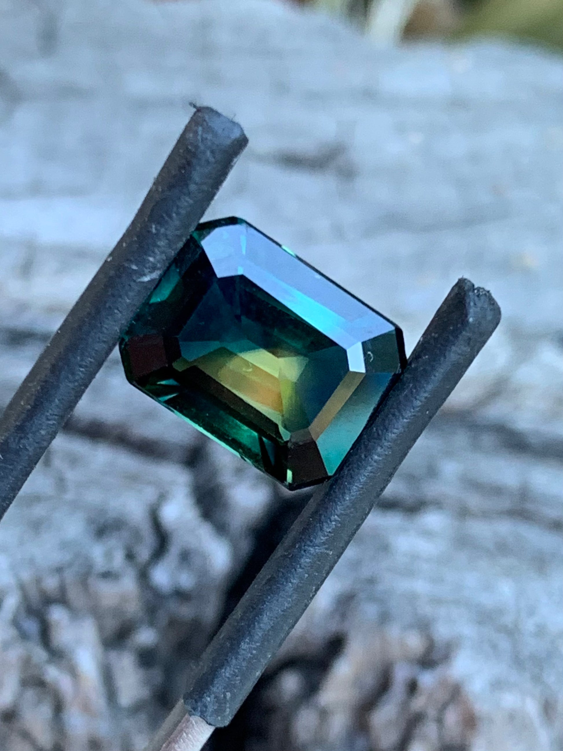 5.1ct emerald cut Australian sapphire with yellow centre and green edges