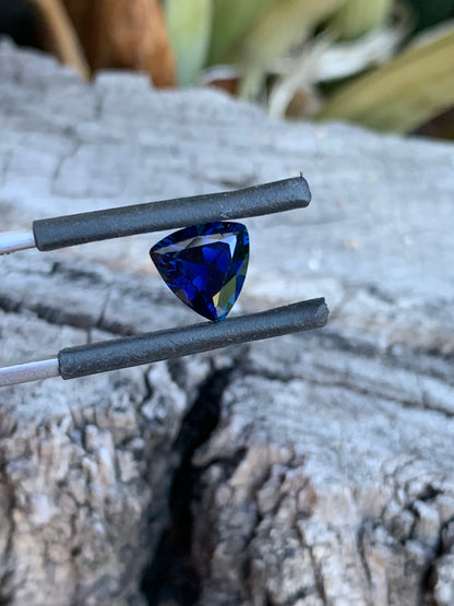 Close-up of a 2.23ct royal blue Australian sapphire in a trillion cut