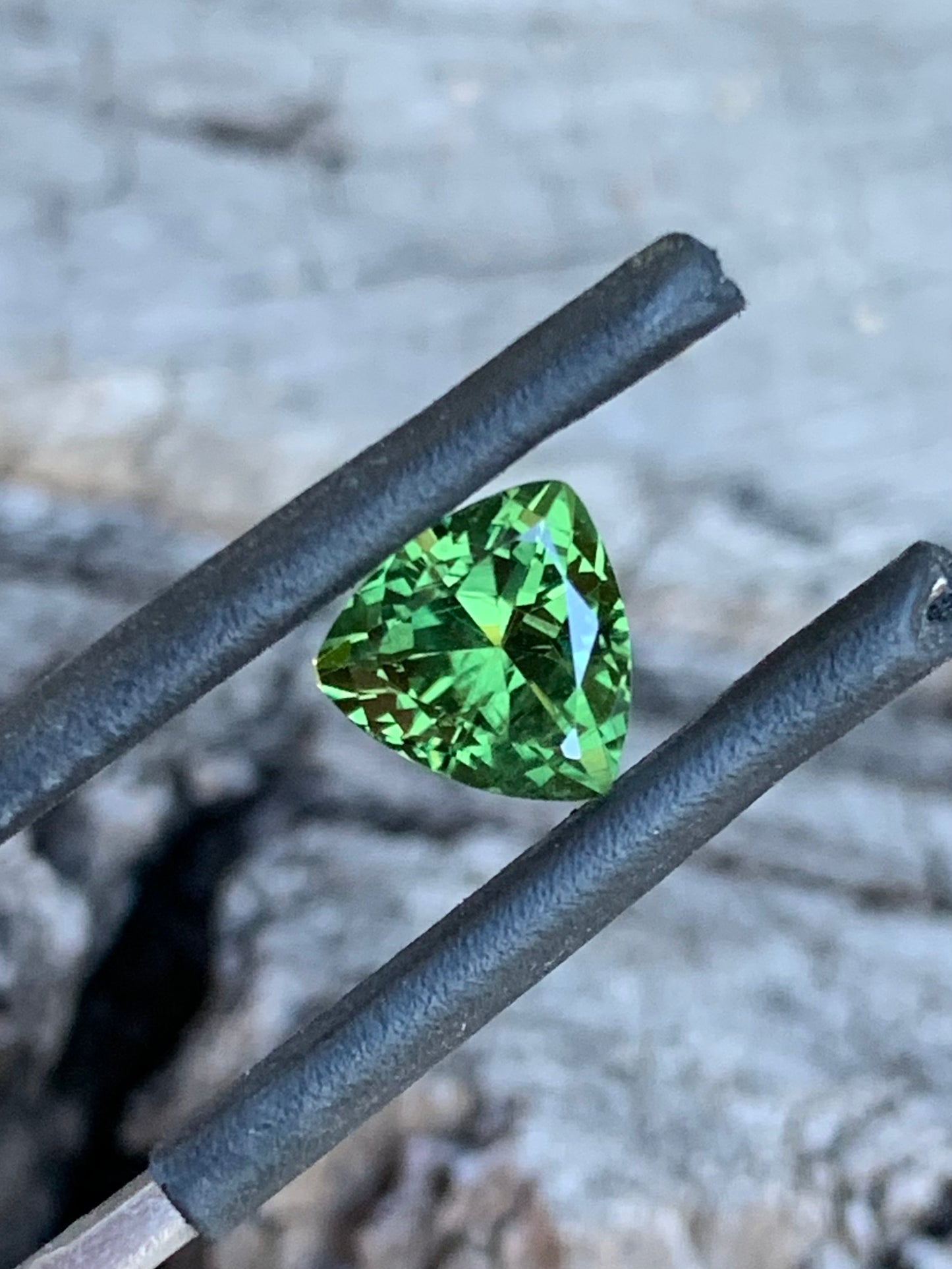 1.74ct light green Australian sapphire in a trillion cut