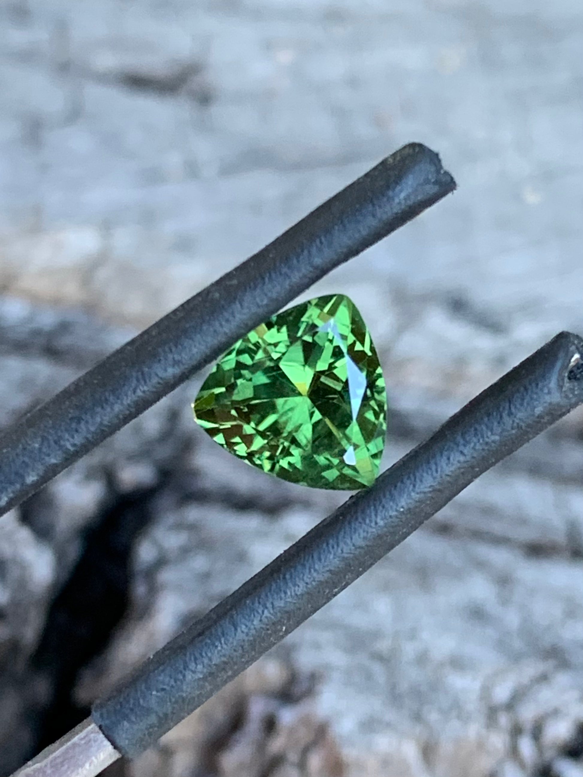 1.74ct light green Australian sapphire in a trillion cut