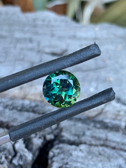 1.96ct teal parti Australian sapphire in a round cut