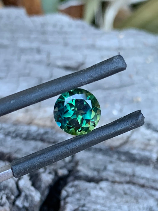 1.96ct teal parti Australian sapphire in a round cut
