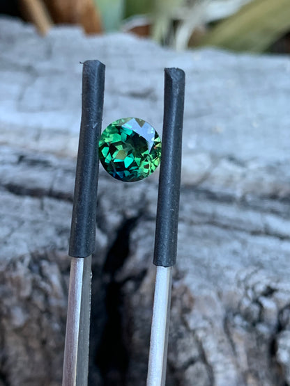 Australian sapphire gemstone with teal and green hues