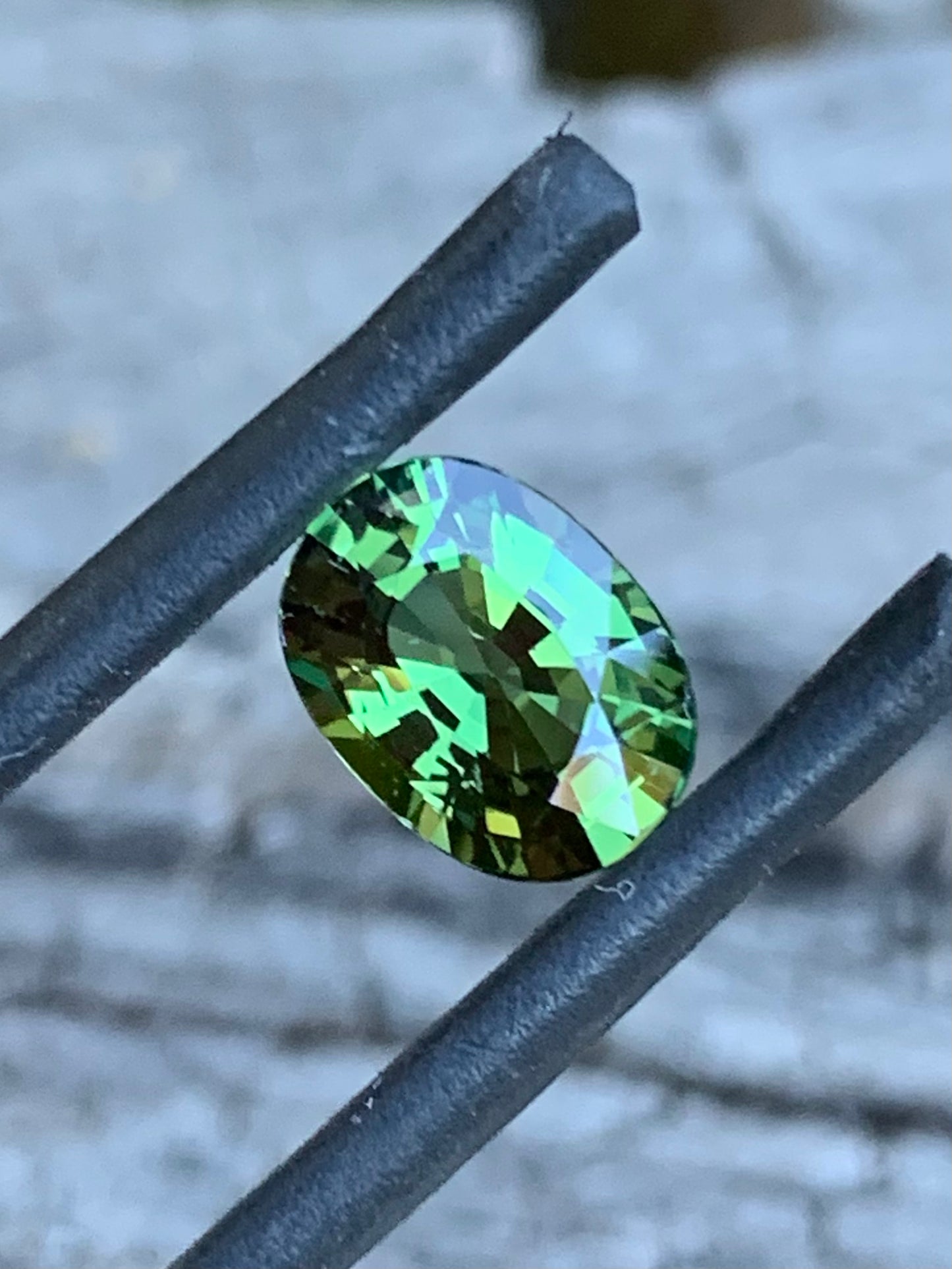 2.25ct green Australian sapphire in an oval cut