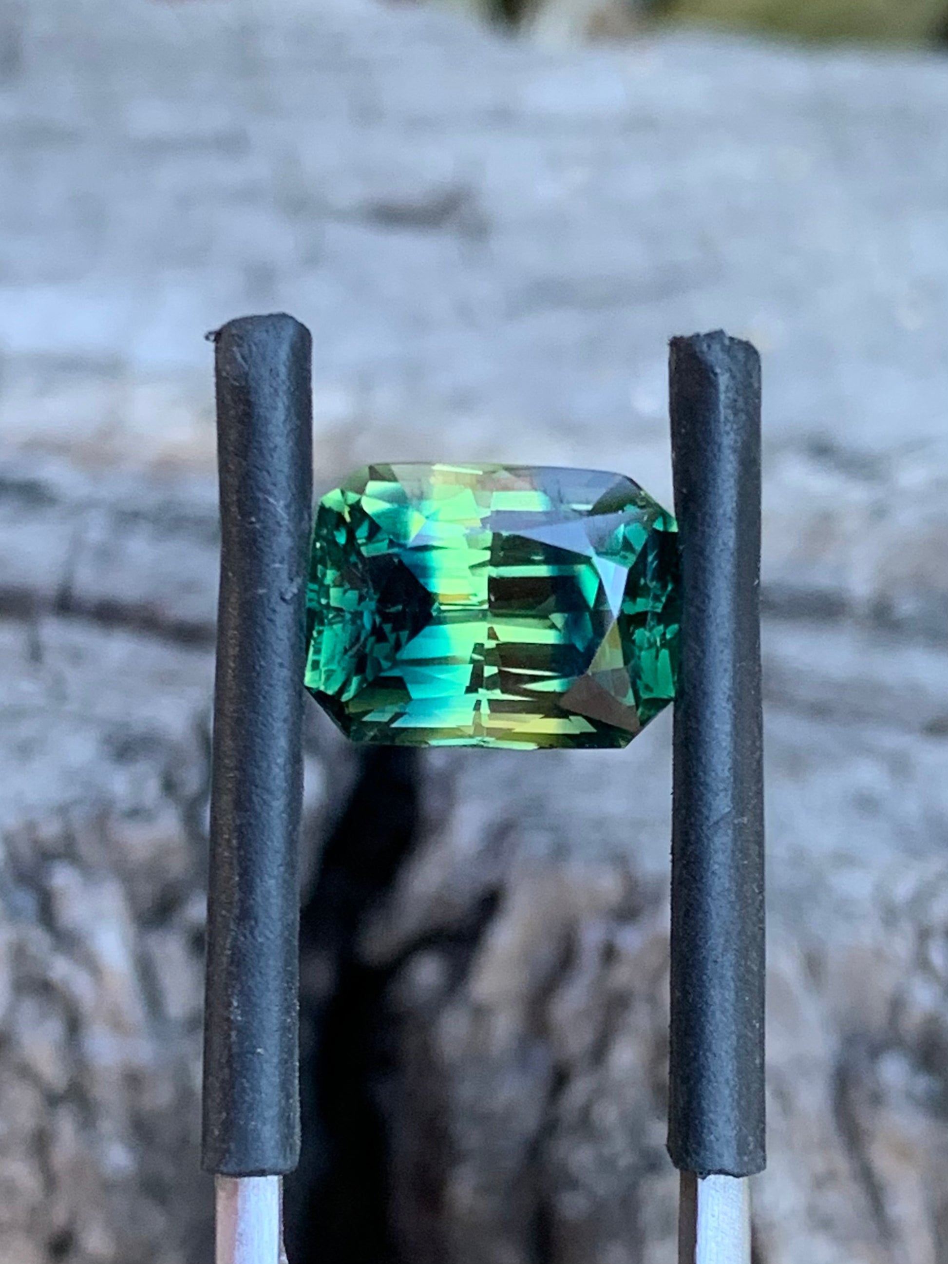 Australian parti sapphire with natural colour zoning and silk patterns