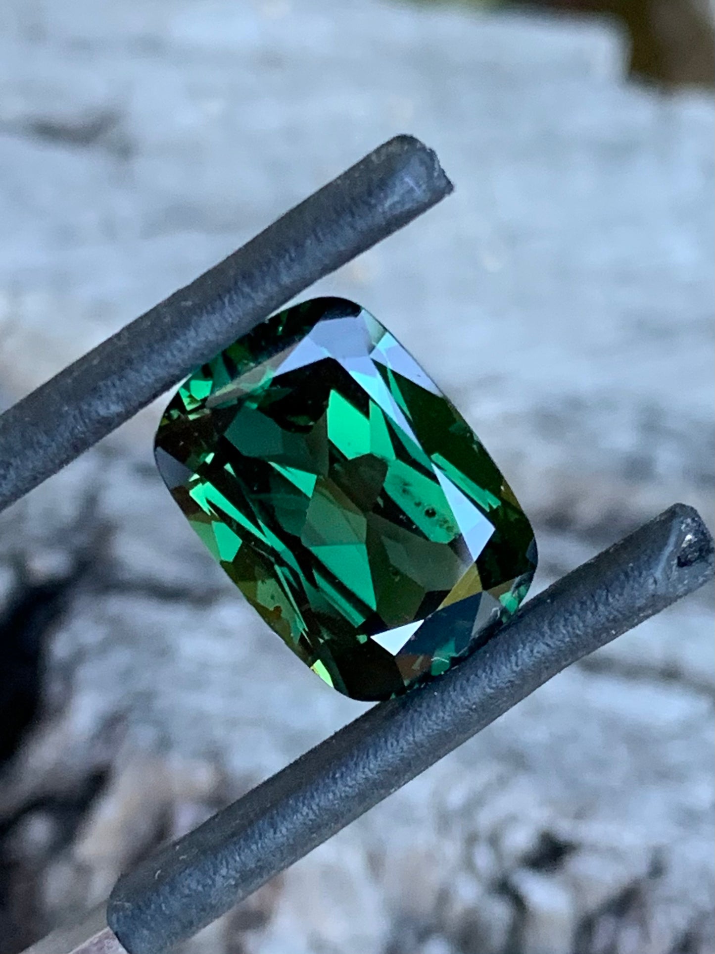5.82ct deep green Australian sapphire with rich, saturated colour