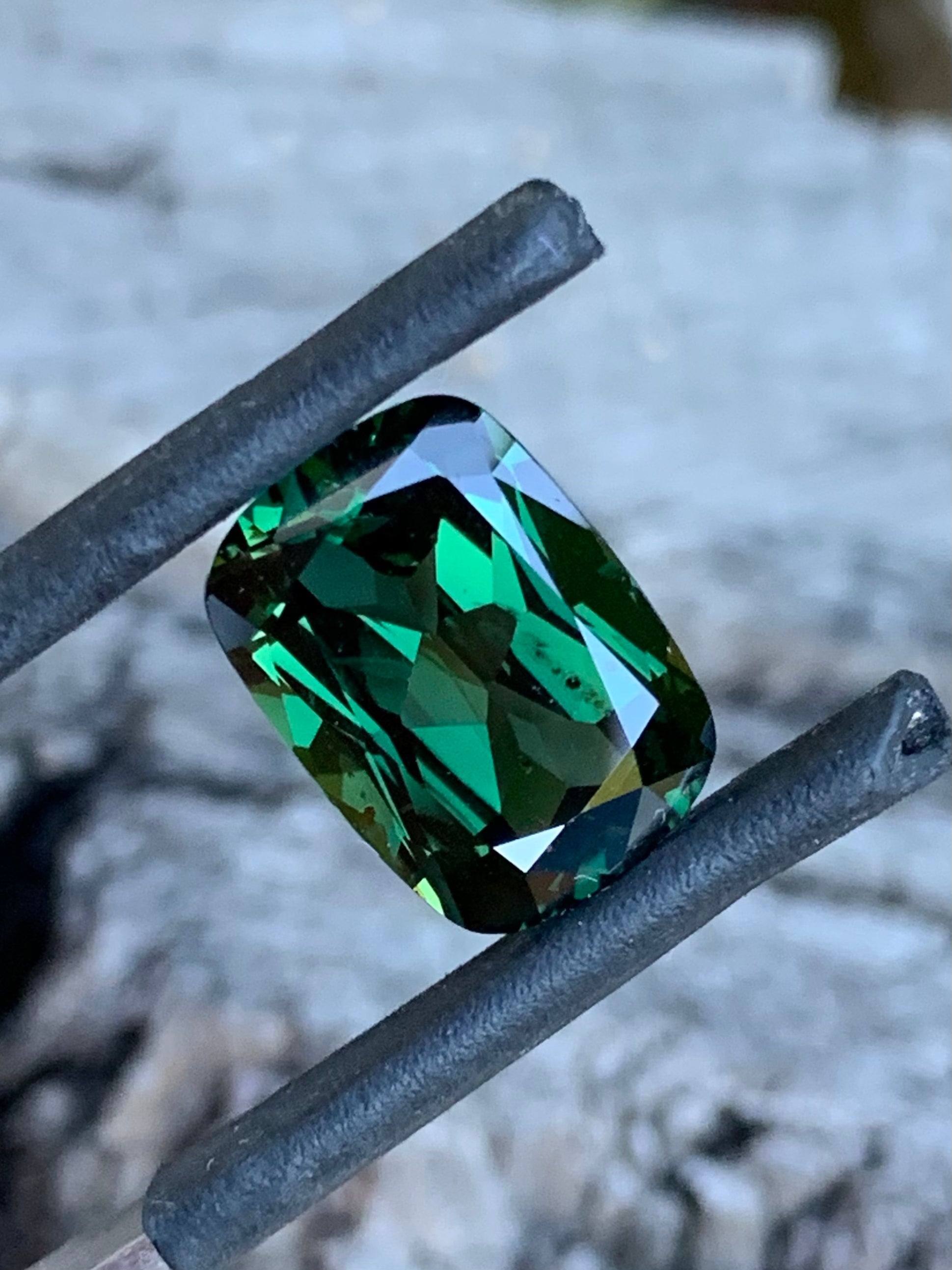 5.82ct deep green Australian sapphire with rich, saturated colour