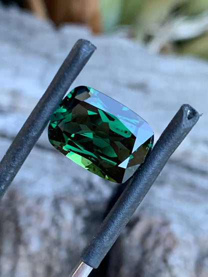 Large 5.82ct green Australian sapphire showcasing depth and brilliance