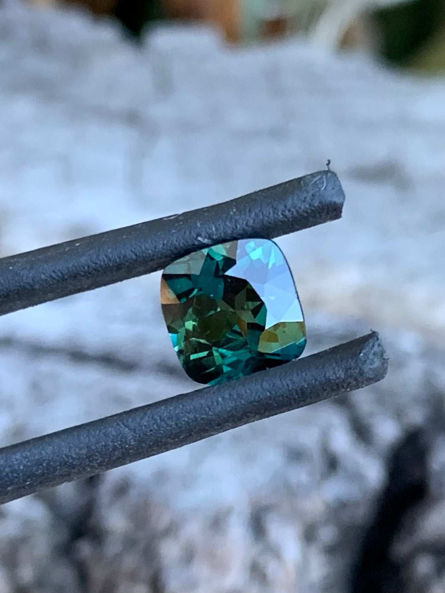 1.91ct teal parti Australian sapphire in a square cushion cut