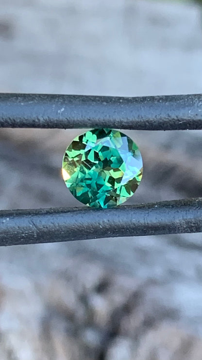 Natural round Australian parti sapphire with vivid yellow zoning