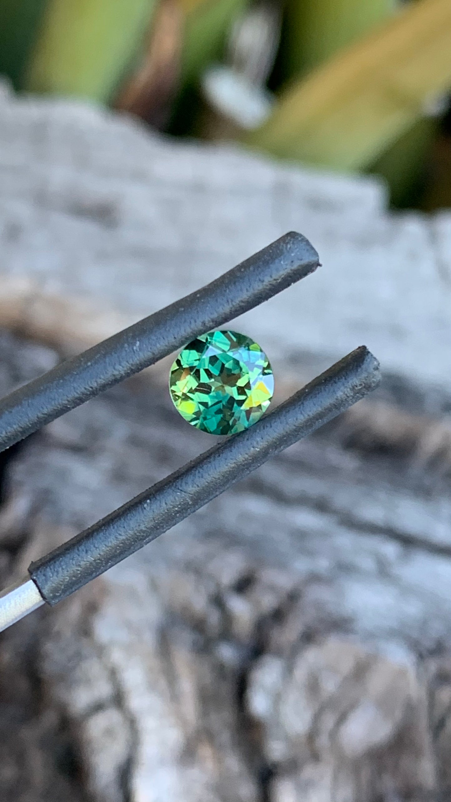 Ethically sourced round Australian parti sapphire with vibrant yellow hues