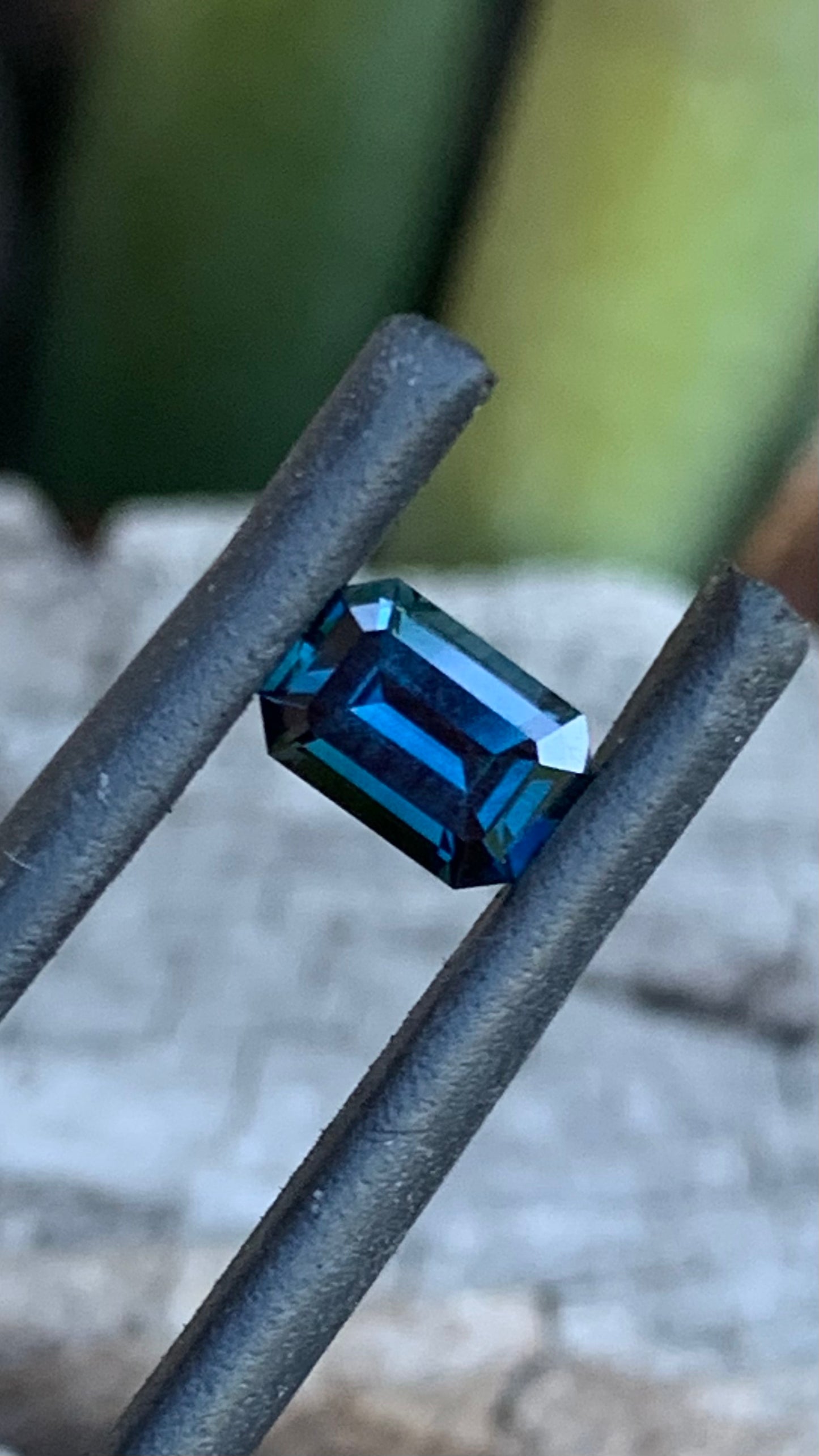 Deep blue emerald cut Australian sapphire