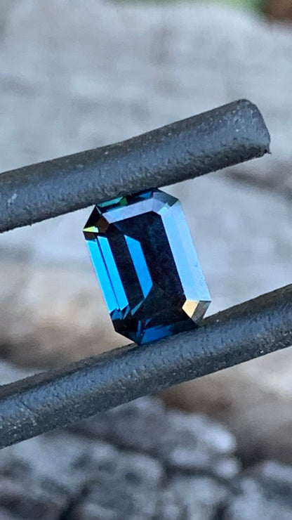 Close up ofDeep blue emerald cut Australian sapphire