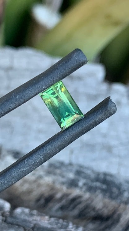 Baguette cut Australian sapphire with light green and yellow zoning
