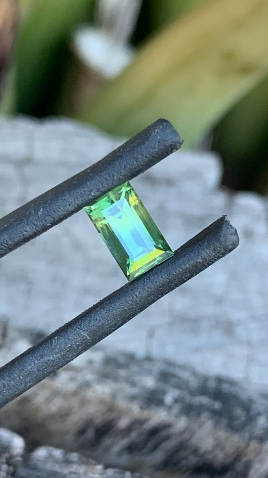 Light green baguette cut Australian sapphire with yellow zoning